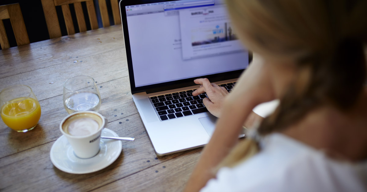 Woman on laptop learning to start a blog